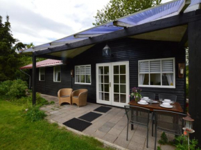 Отель Cozy Holiday Home in Moergestel with Garden  Моергестел